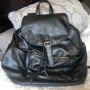 Black leather backpack purse